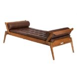 A brown leather and oak daybed by Rene-Jean Cailette, H 70 - W 218 - D 87,5 cm
