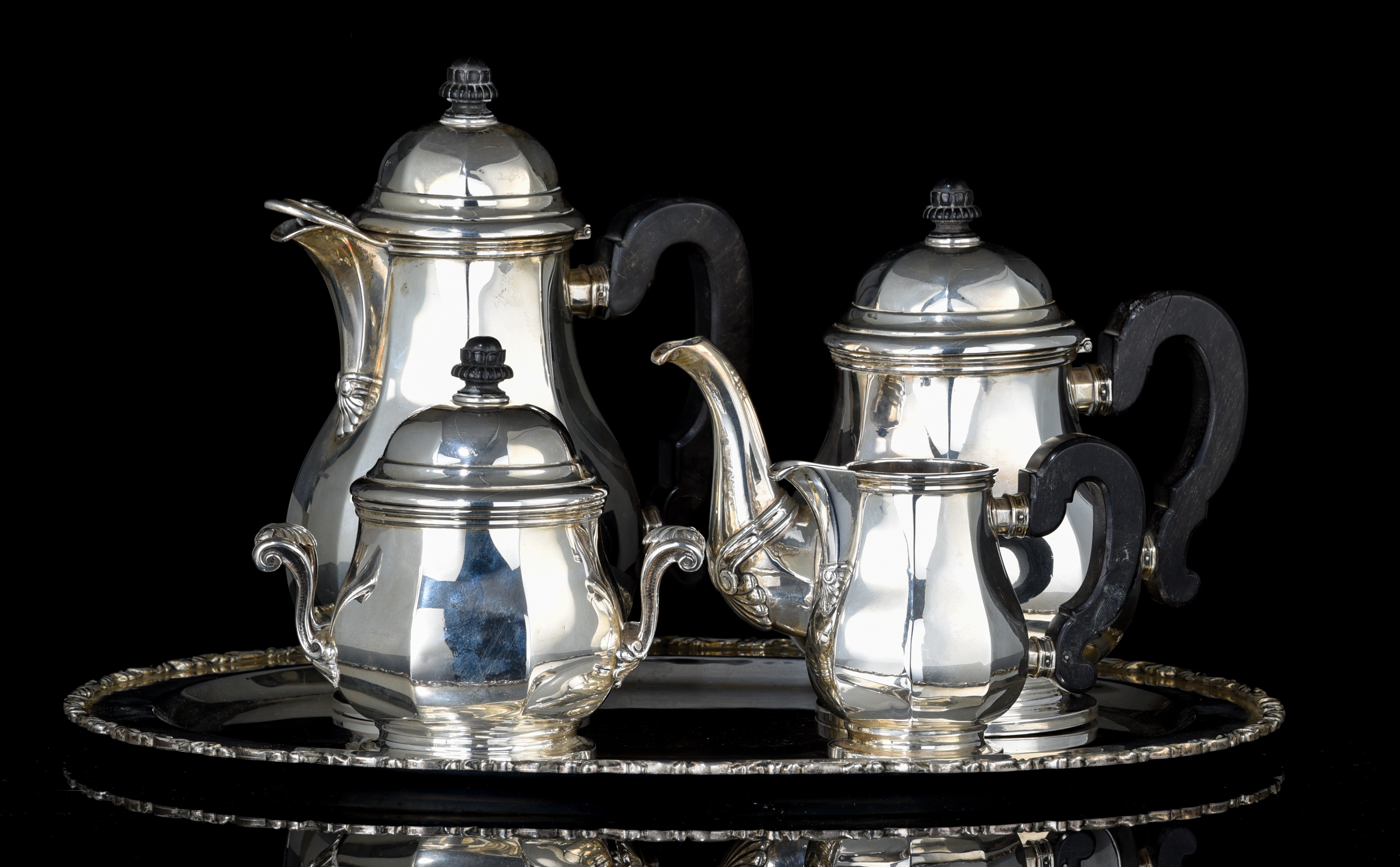 A Baroque Revival silver four-part coffee and tea set, with a matching tray, weight: 3373 g