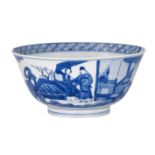 A Chinese blue and white figural bowl, Kangxi mark and of the period, H 7,5 - dia. 16 cm