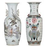 A Chinese famille rose 'Flower basket' vase, paired with Fu lion head handles, 19thC, H 59 cm - and