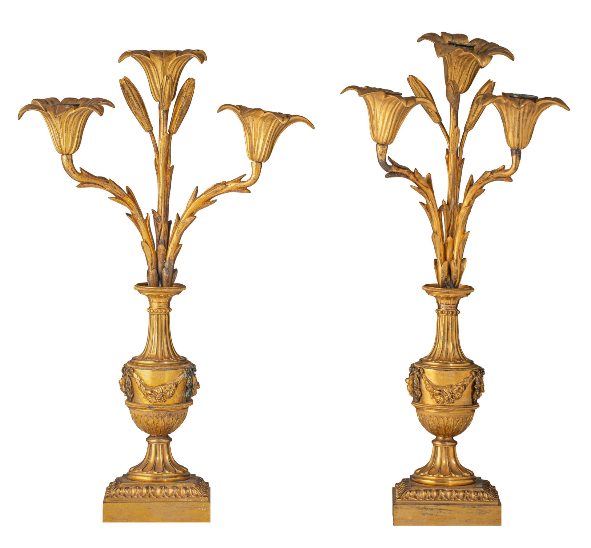 A pair of Neoclassical gilt bronze floral candelabras, H 48 cm