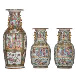 A Chinese Canton famille rose vase, 19thC, H 63 cm - and a similar pair of ditto vases, 19thC, H 43