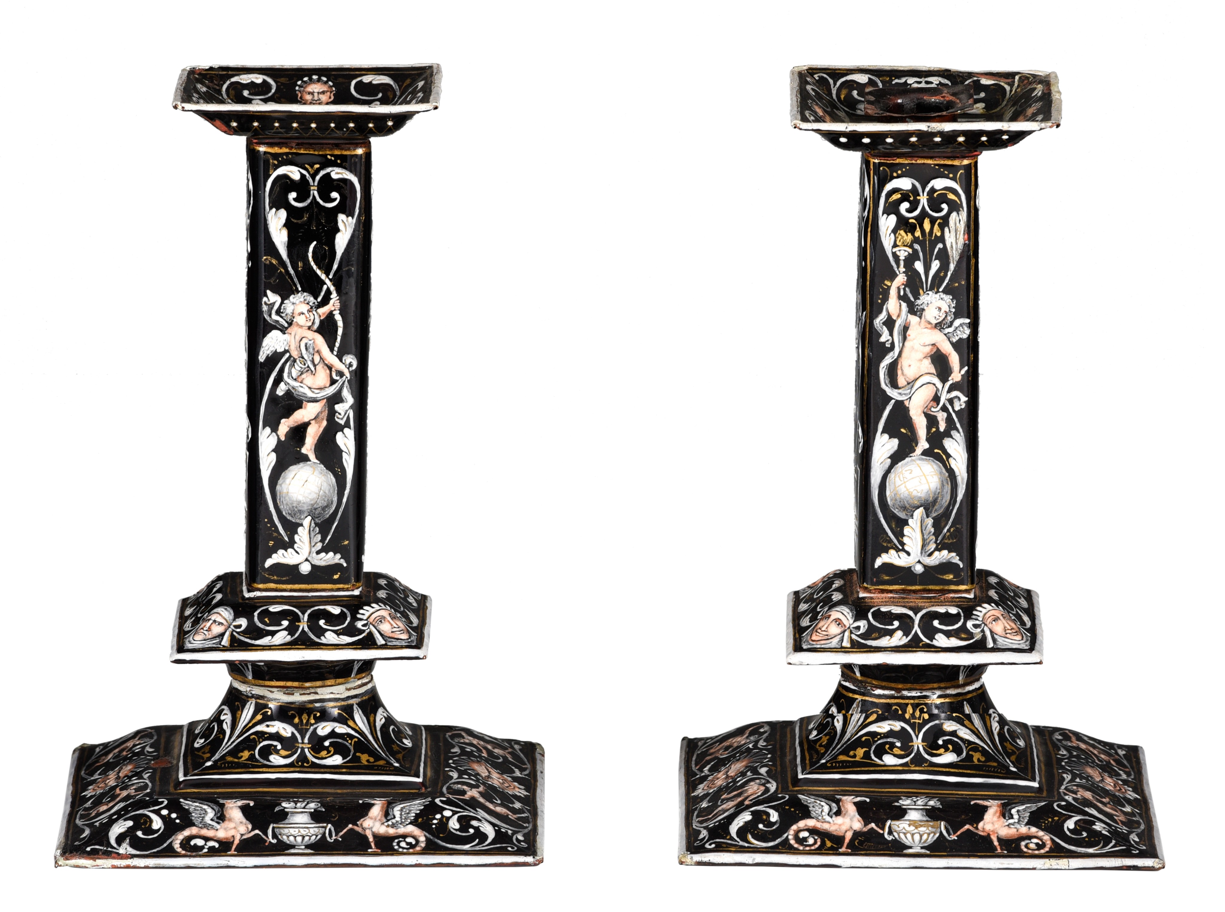 A pair of 17thC Limoges enamel candlesticks, H 23 cm (+)