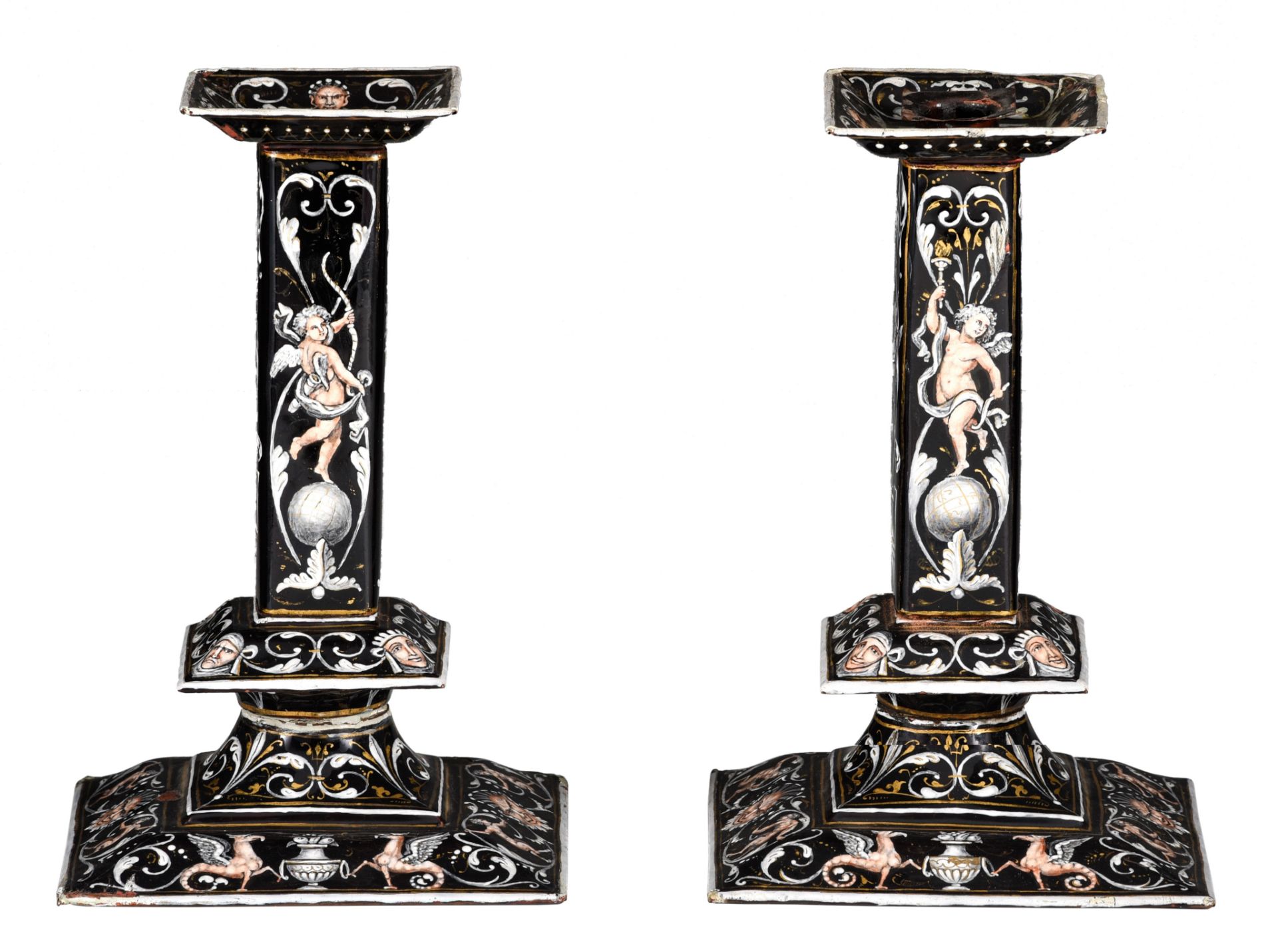 A pair of 17thC Limoges enamel candlesticks, H 23 cm (+)