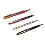 A collection of Dupont and Mont Blanc fountain pens, a rollerball and a ballpoint