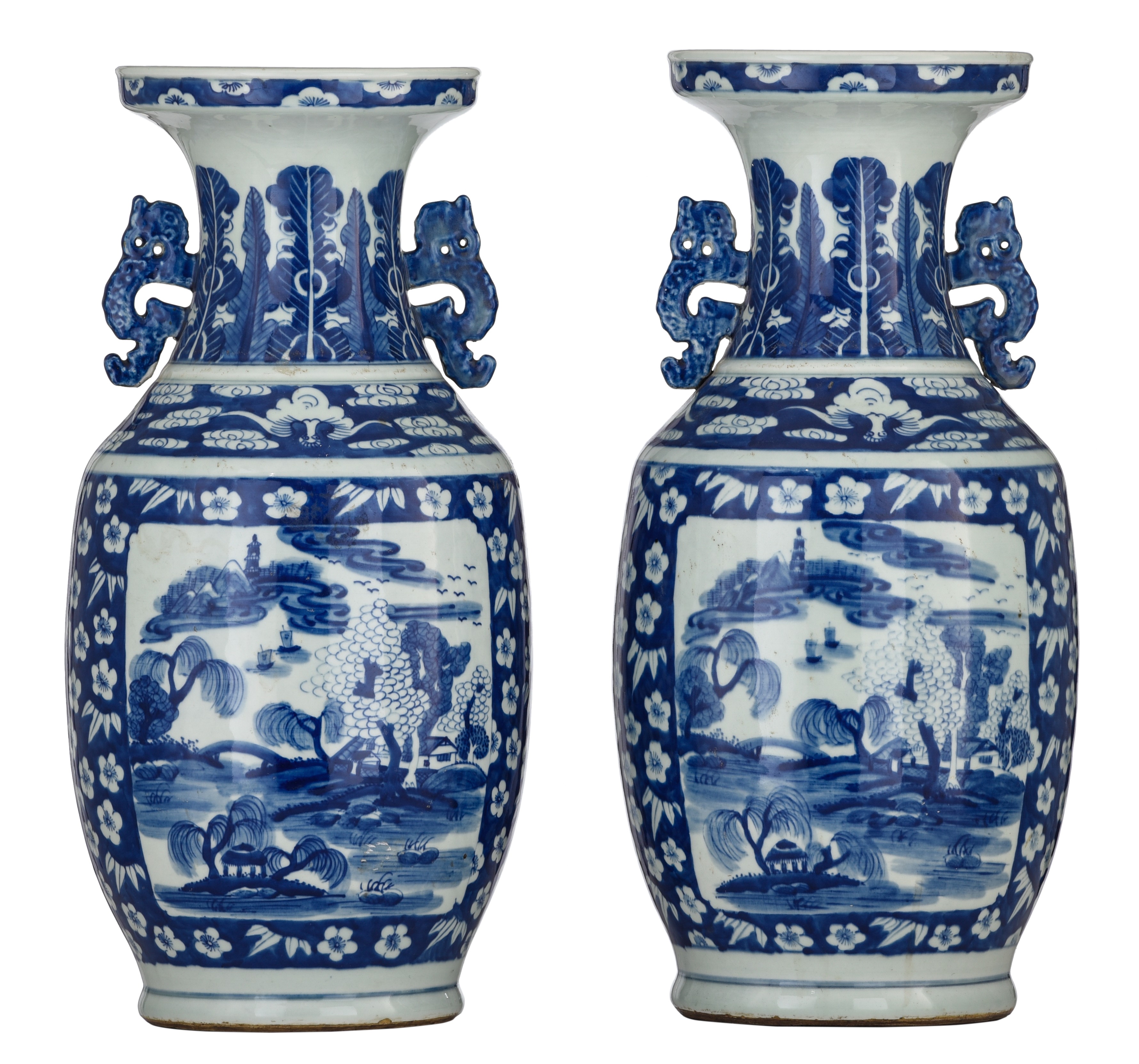 A pair of Chinese blue and white vases, paired with stylised-dragon handles, 19thC, H 49-50 cm