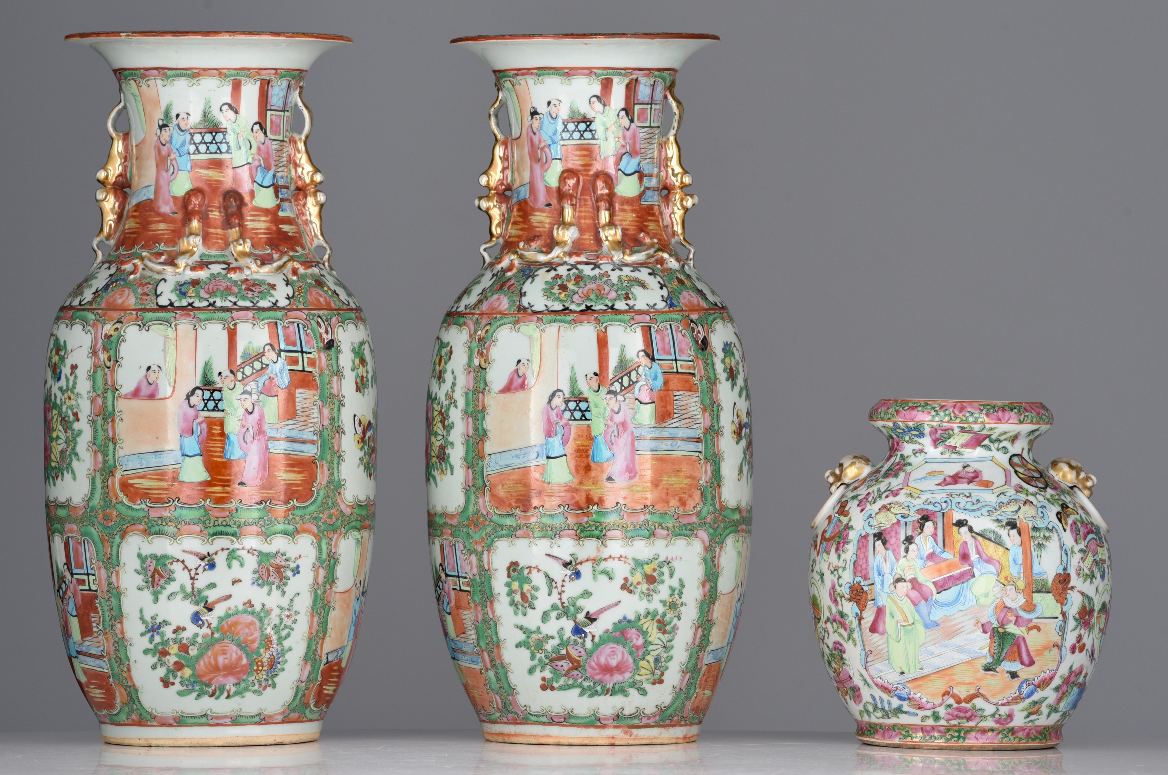 A similar pair of Chinese Canton famille rose vases, 19thC, H 44,5 cm - added a Chinese Canton pomeg - Image 4 of 7