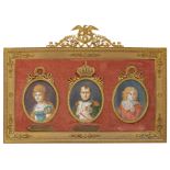 An Empire gilt bronze frame with three miniature portraits of the Bonapartes, 26,5 x 36 cm