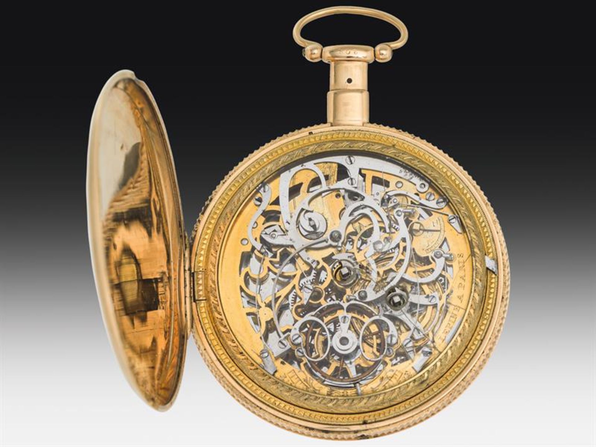 Golden pocket watch with quarter-hour repetition