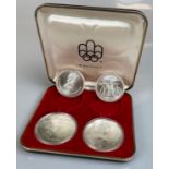 Set aus 4 Silbermünzen "Olympiade XXI in Montréal" / Elisabeth II (Kanada, 1976).
