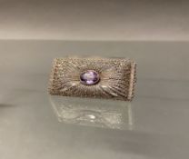 Brosche, Anfang 20. Jh., Silber 835, oval facettierter Amethyst ca. 12 x 8 mm, Markasitenbesatz, 5.