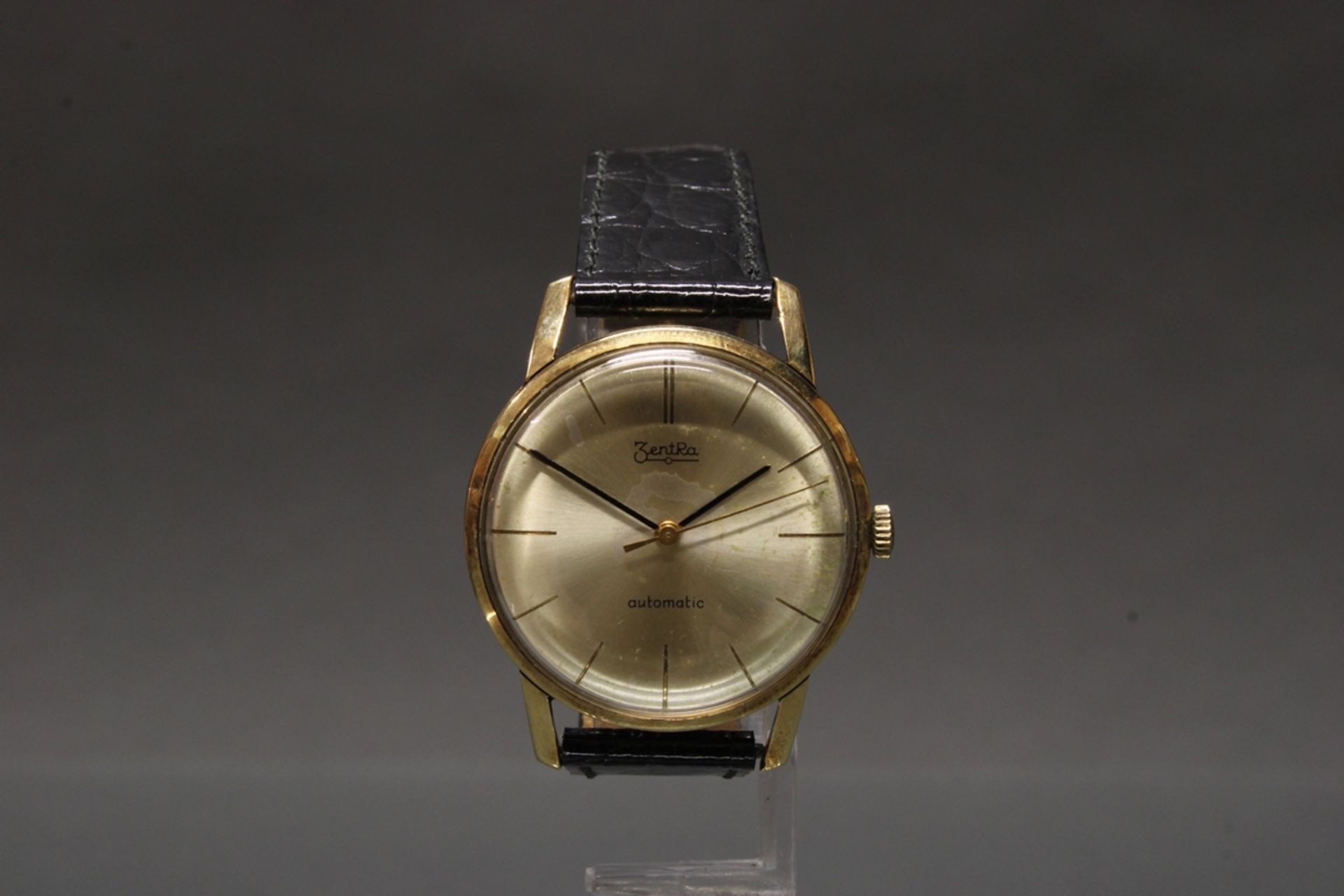 Herrenarmbanduhr, Zentra, 1960er Jahre, Automatik, Gehäuse GG 585, goldfarbenes Zifferblatt, Strich