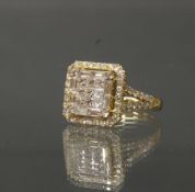 Ring, GG 750, Brillanten und Diamanten zus. ca. 1.45 ct., etwa fw-w/vvs-si, im Baguette- bzw. Princ