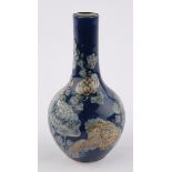 Flaschenvase, China, 19. Jh., Porzellan, puderblaue Glasur, im Relief verziert mit Chrysanthemen, P