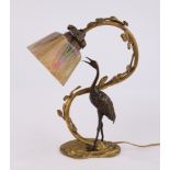 Tischlampe, "Reiher an Ranke", Anfang 20. Jh., bronziertes Metall, farbiger Glasschirm vierseitig,