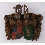 Wappenschild, deutsch, 18./19. Jh., Nussbaum, farbige Allianz-Wappen unter Harnischen umrahmt von A