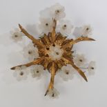 Deckenlampe, Italien, 20. Jh., Metall, goldbronziert, Blattzier, Blüten aus farblosem Glas, sechsfl