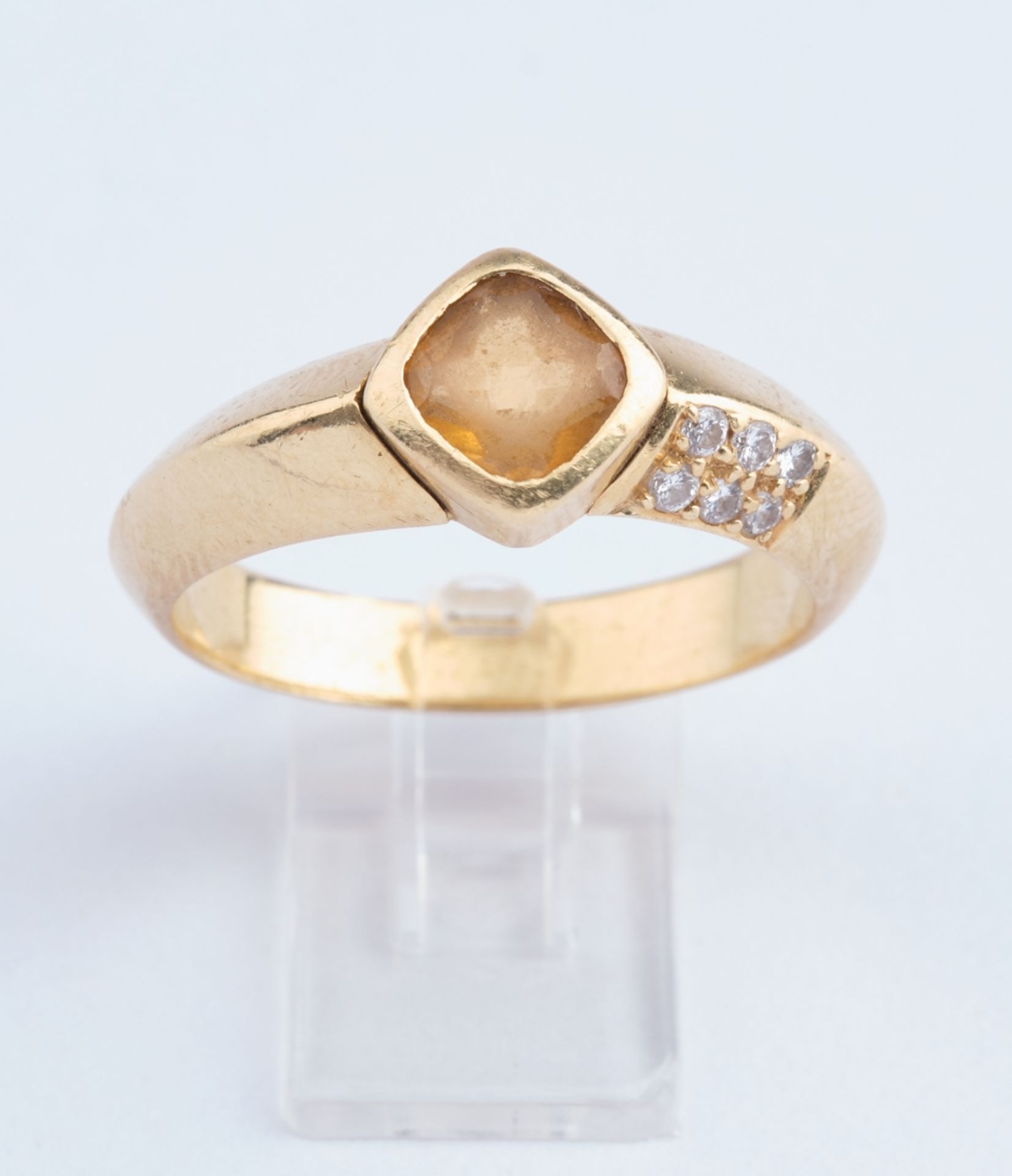 Ring, GG 750, Citrin, 6 Brillanten zus. ca. 0.12 ct., RM 18.5, 6.88 g, Stein berieben