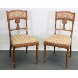 Paar Stühle, 19. Jh., Nussbaum, zierliche Proportionen, geschnitztes Lehndekor, Sitzfläche gepolste
