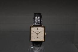 Armbanduhr, Giroxa, 1950er/60er Jahre, Handaufzug, quadratisches Stahlgehäuse, teils vergoldet, Geh