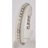 Armband, WG 750, 36 Brillanten zus. ca. 2.20 bis 2.50 ct., etwa w-tcr/vvs-vs, 3 Brillanten zus. ca.