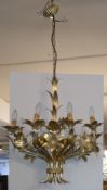 Deckenleuchter in Form eines stilisierten Lilienstraußes, 19./20. Jh., golden gefasst, 8-flammig, H