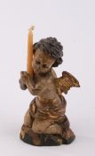 Geflügelter Putto, 18. Jh., Holz geschnitzt und polychrom gefasst, 12 cm hoch, Fehlstelle und Ergän