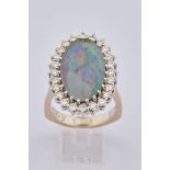 Ring, WG 585, Opal, zentral gefasst, Karmoisierung aus Brillanten zus. ca. 1.20 ct., RM 18, 10.32 g