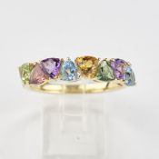 Ring, GG 750, 2 Topase zus. ca. 0.57 ct., Rodolith ca. 0.24 ct., Citrin ca. 0.20 ct., Peridot ca. 0