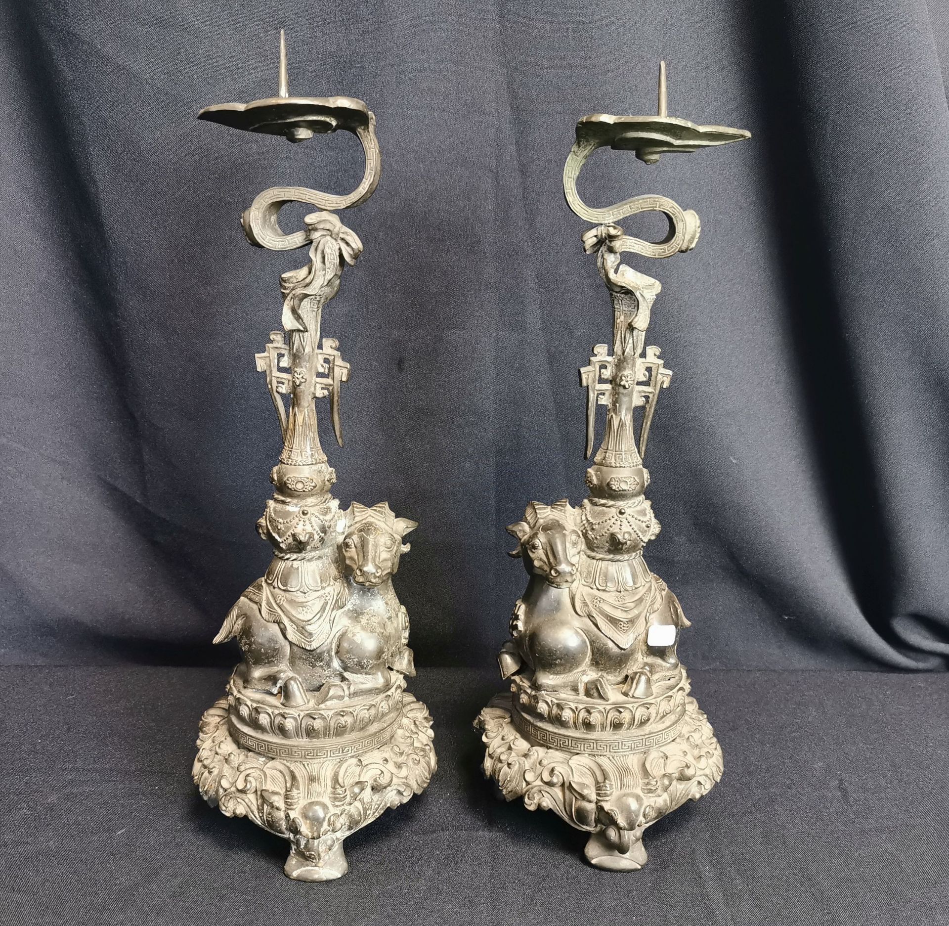 PAIR OF CANDLE STANDS WITH RAMS