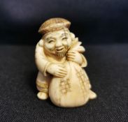 NETSUKE "HÄNDLER"