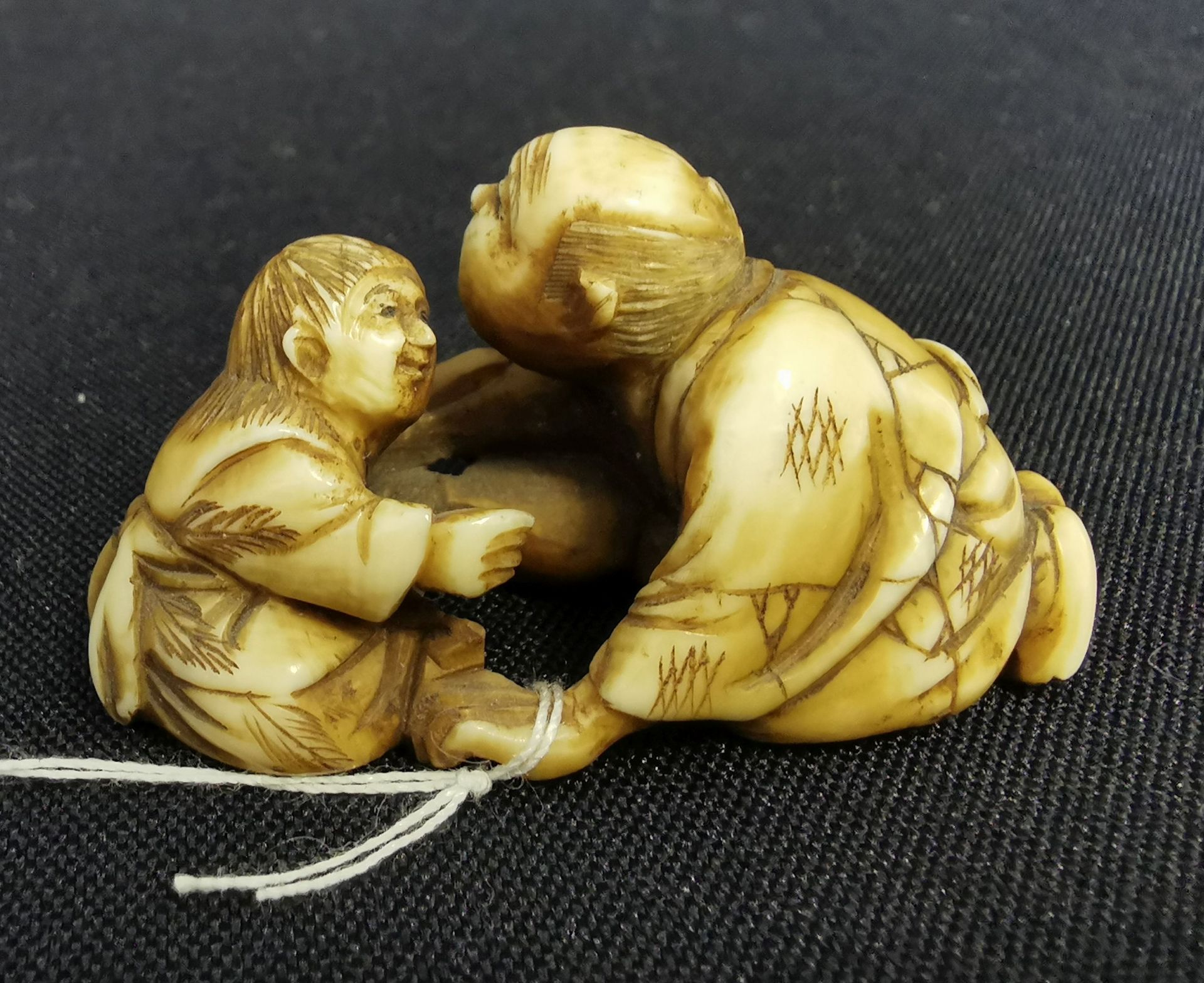 FINE NETSUKE: MAN WITH CHILD