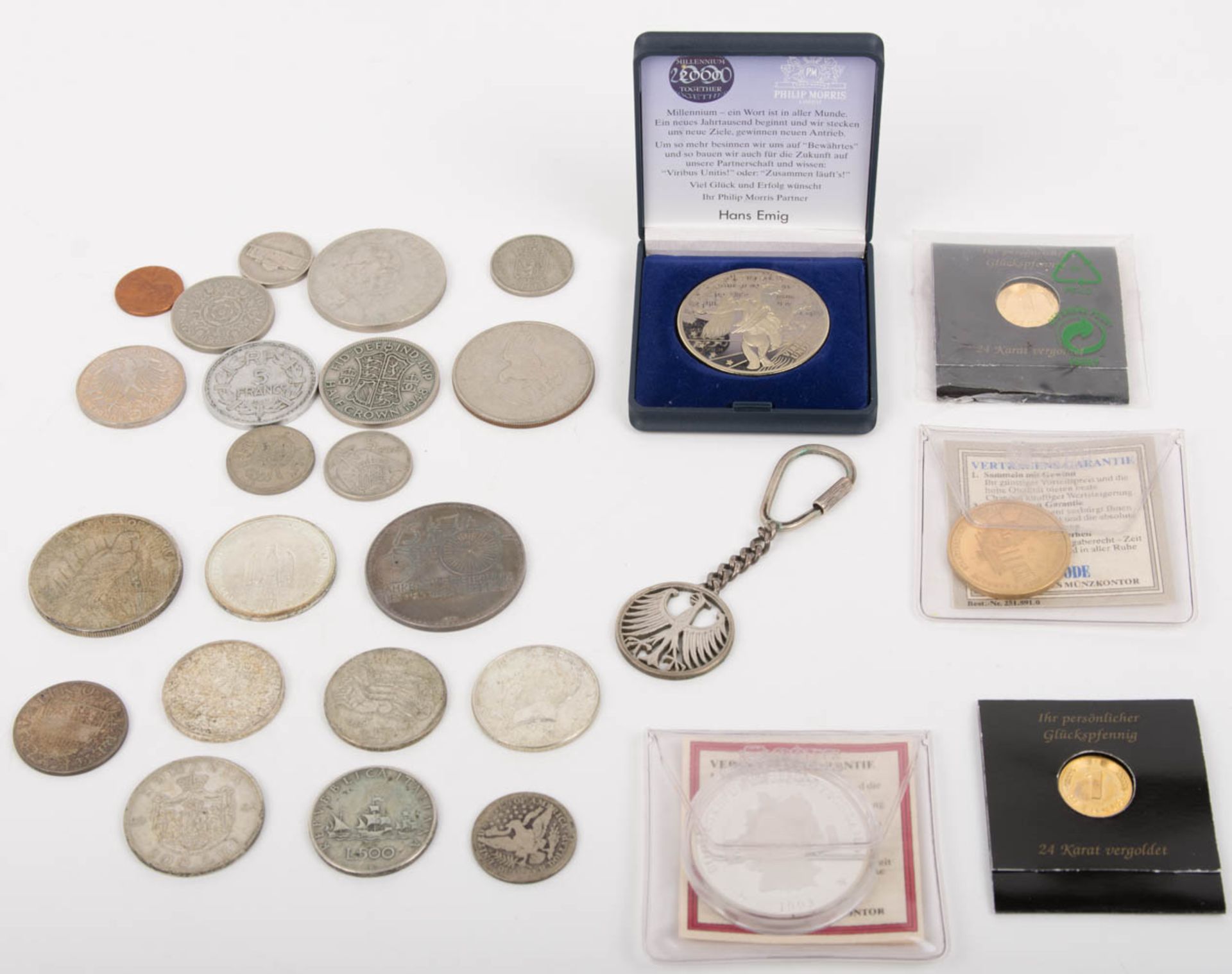 Konvolut aus Münzen, darunter Silbermünzen.