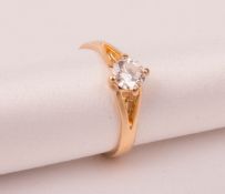 Feiner Ring mit Diamant, 750er Gelbgold.