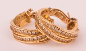 Cartier Ohrringpaar mit Diamanten, 750er Gelbgold.