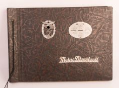 Album "Meine Dienstzeit" mit Erdkampfabzeichen der Luftwaffe.