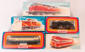 Märklin Konvolut von fünf Loks und Schienenzubehör.