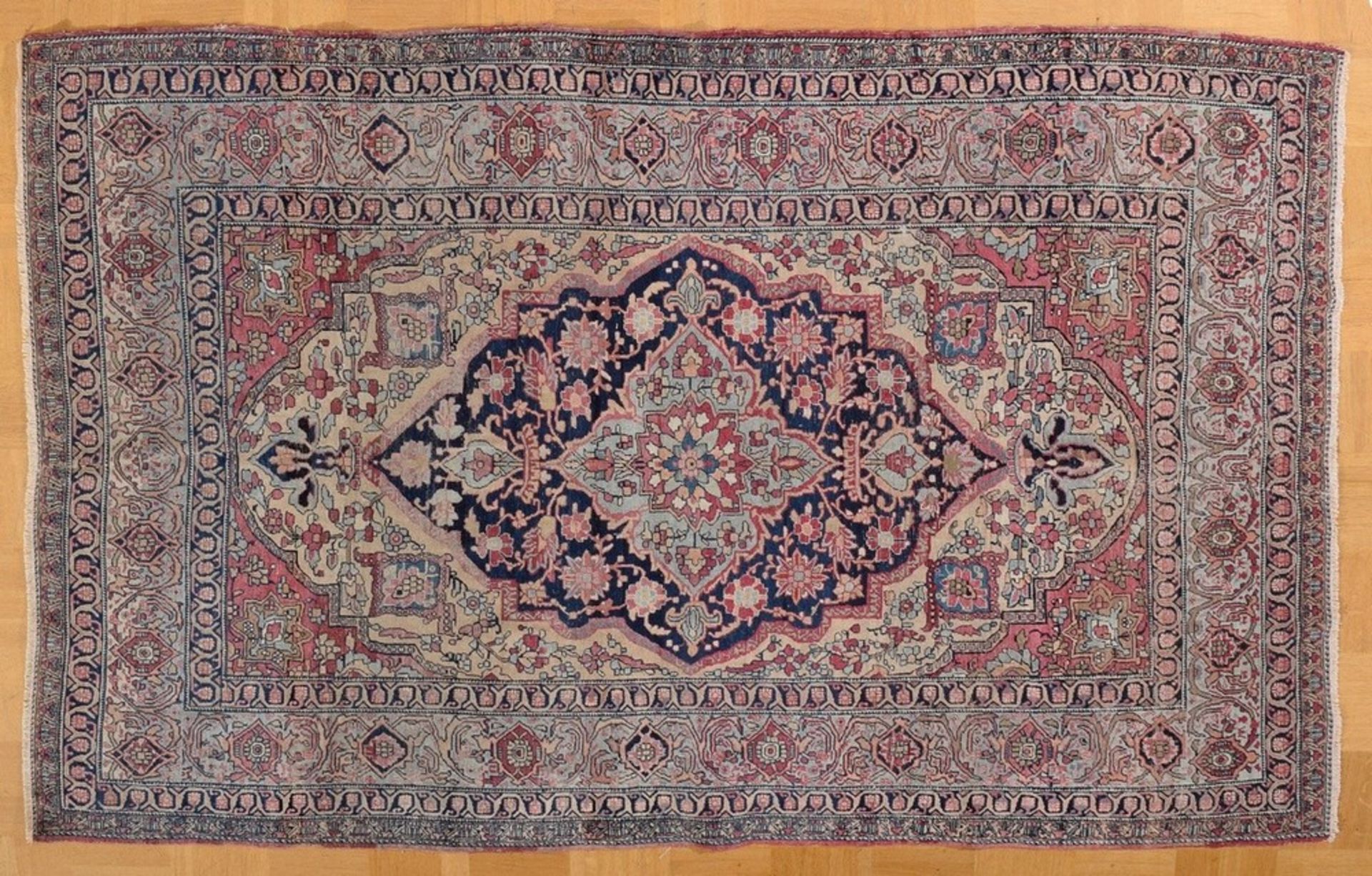 A very finely woven carpet from Tehran, with a densely closed velvet-like pile in pastel colours, d