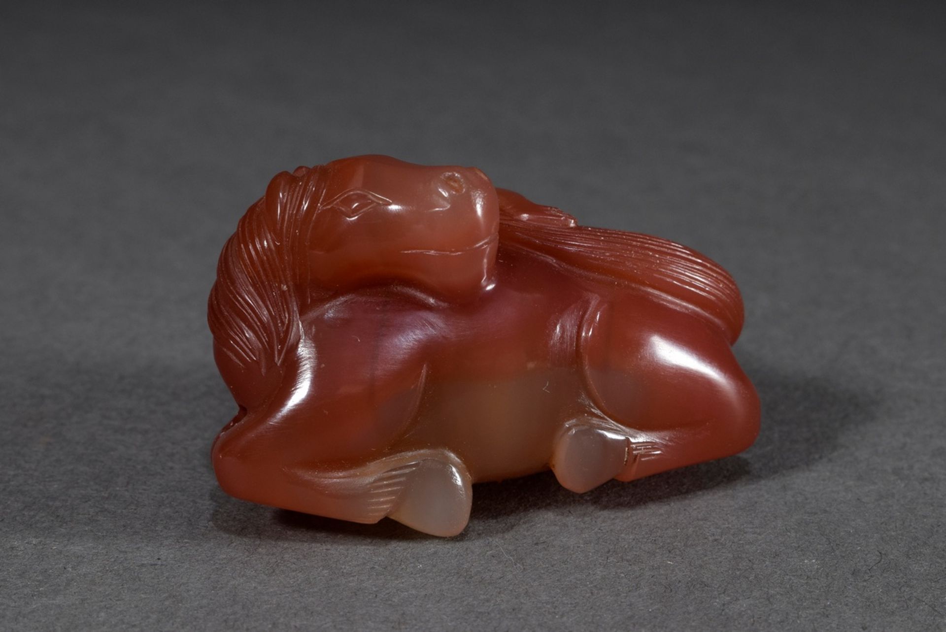 Carved carnelian toggle "Horse and Monkey", China, 6x3,5cm
