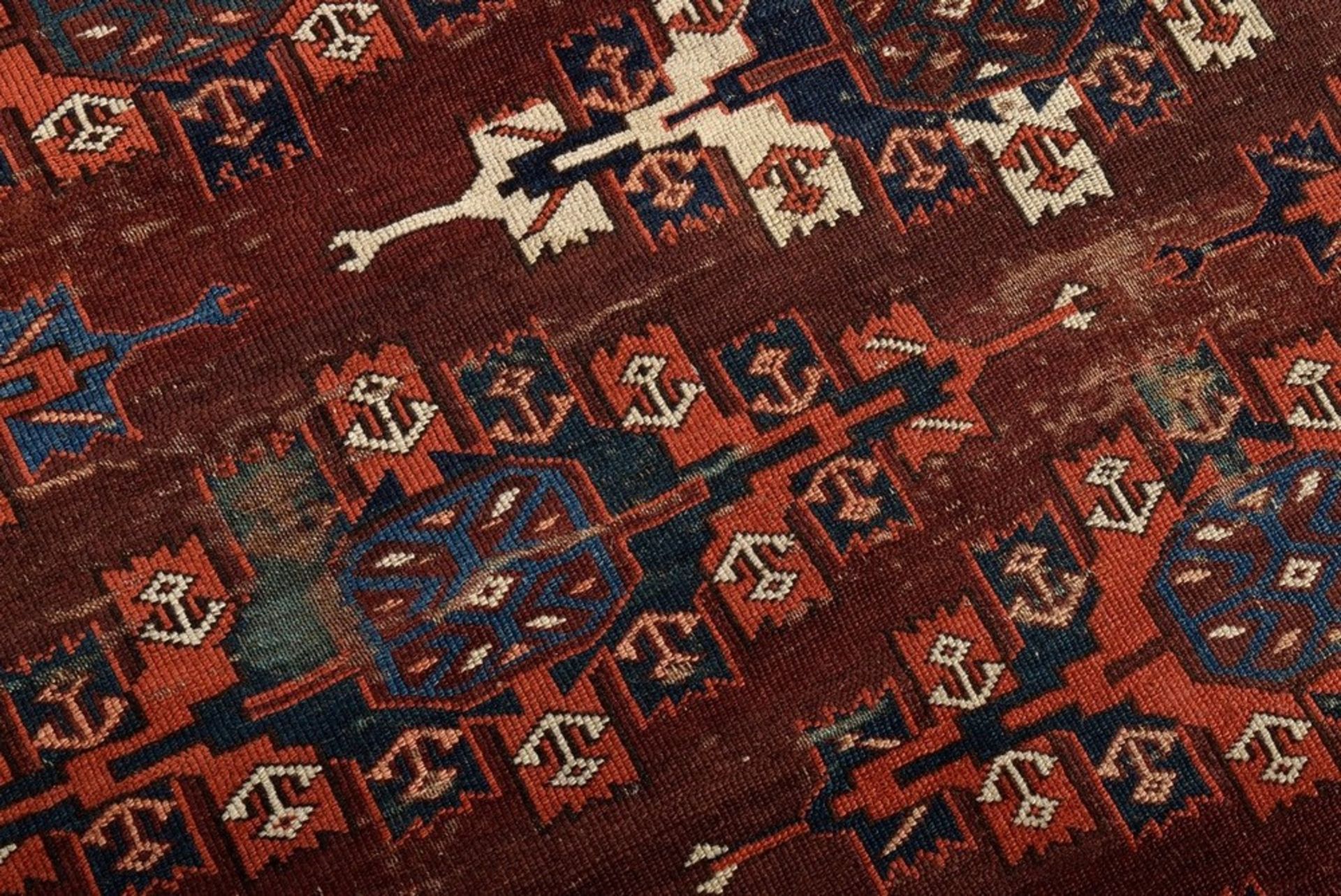 A Yomud main carpet with flat kepse güls arranged in offset colours, a white-ground main border wit - Image 4 of 7