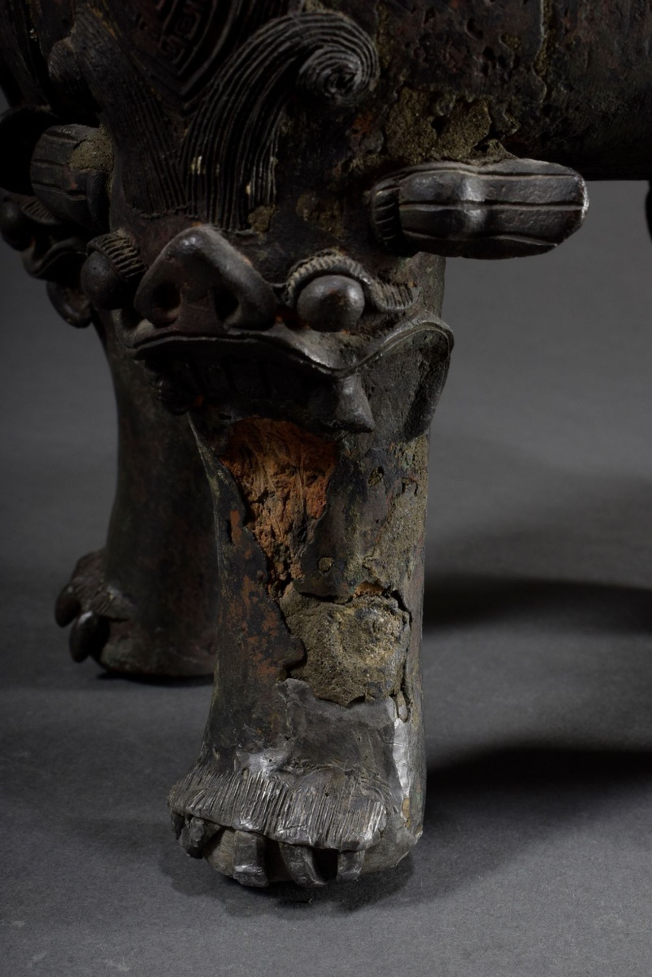 Large angular bronze lidded koro with archaic reliefs paw feet and fo-lion knob, China Qing period, - Image 6 of 13