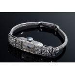 Feine Platin Art Deco Damenarmbanduhr mit Diamanten im Brillant- und Achtkantschliff (zus. ca. 0.90