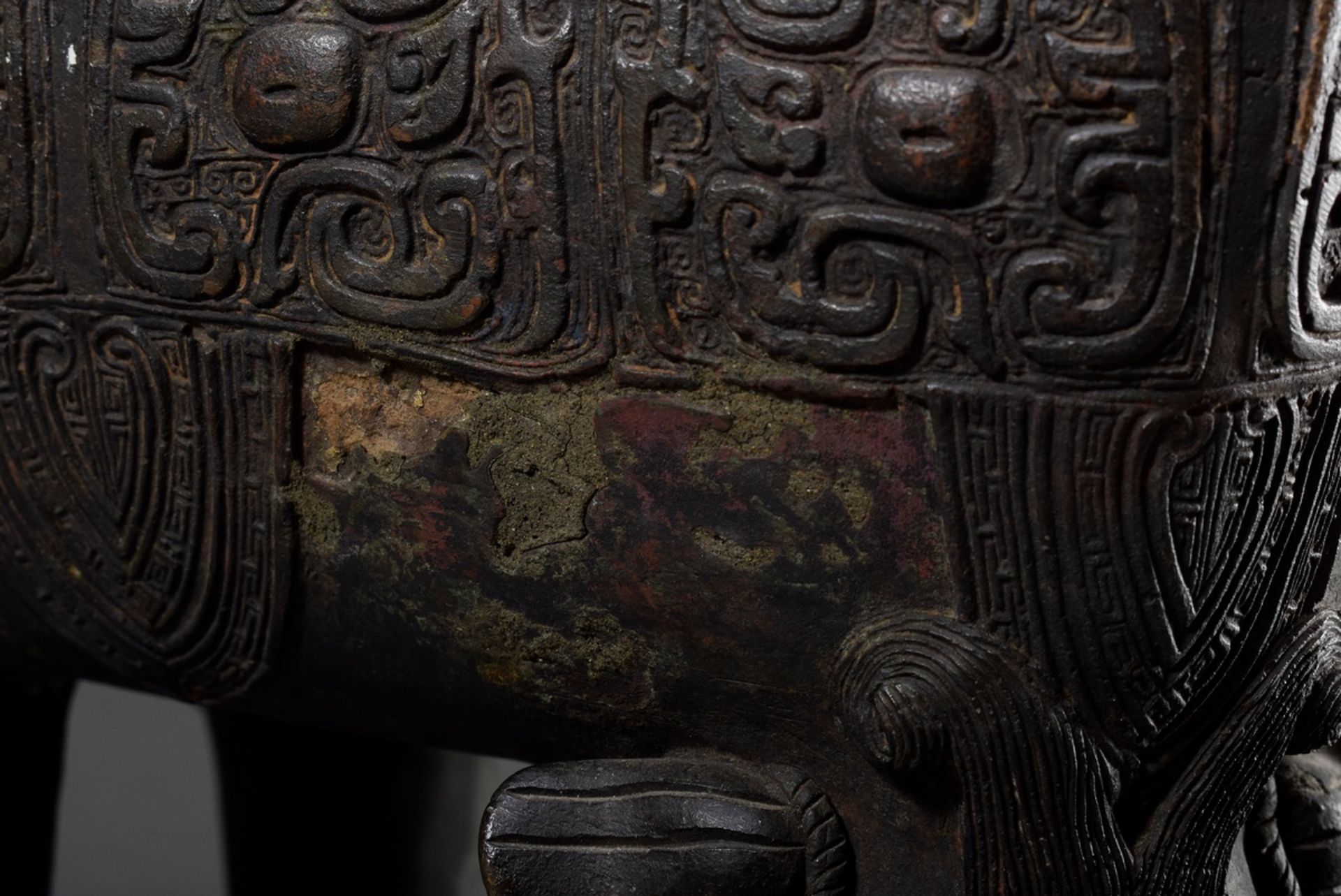 Large angular bronze lidded koro with archaic reliefs paw feet and fo-lion knob, China Qing period, - Image 11 of 13