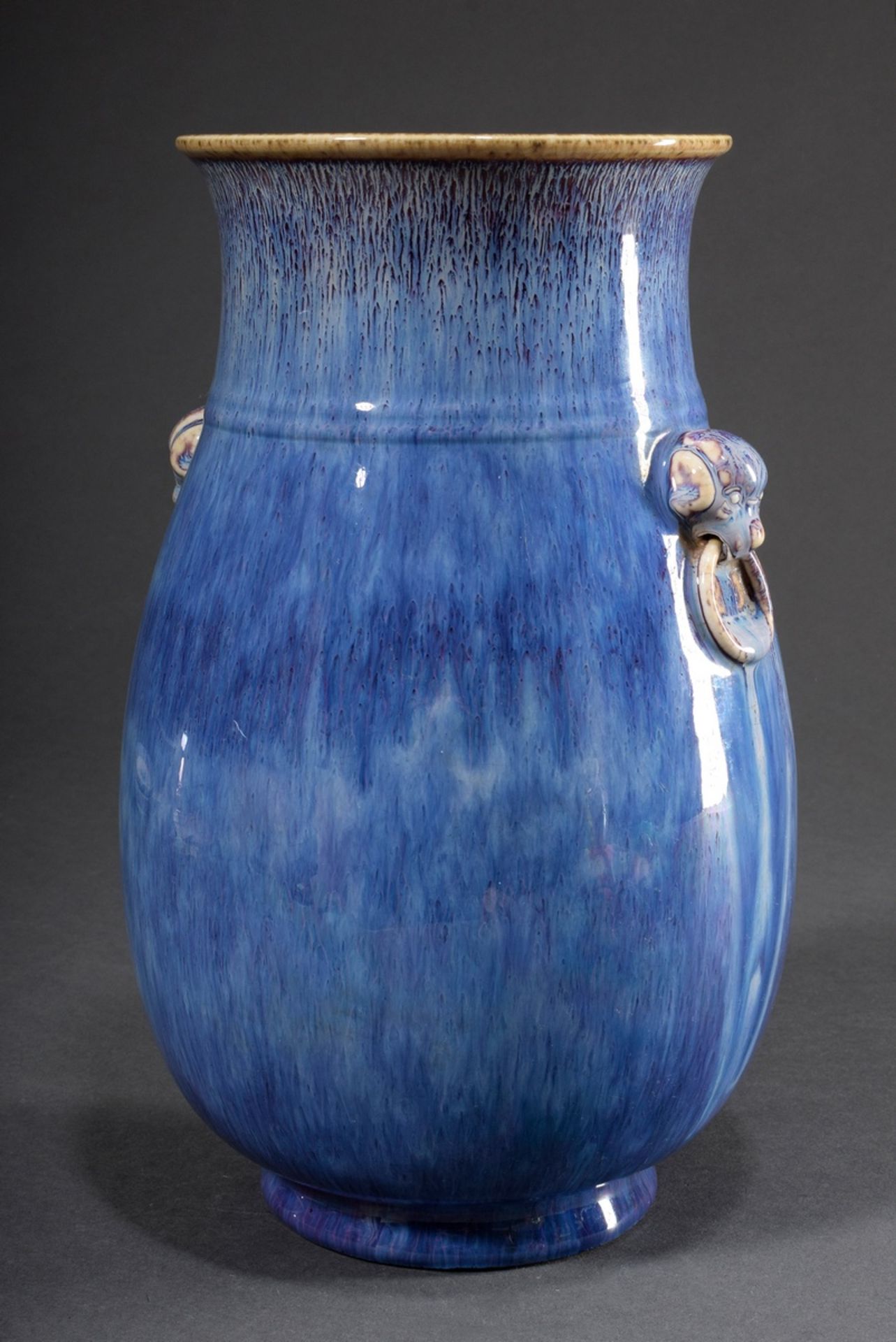 Chinese vase with unusual blue flambé glaze and lion head mascarons, early 20th c., h. 29,4cm