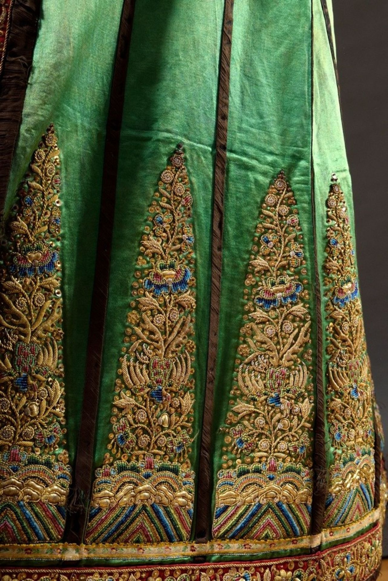 A Chinese woman's skirt in green silk with elaborate gold thread and bead embroidery as well as met - Image 3 of 4