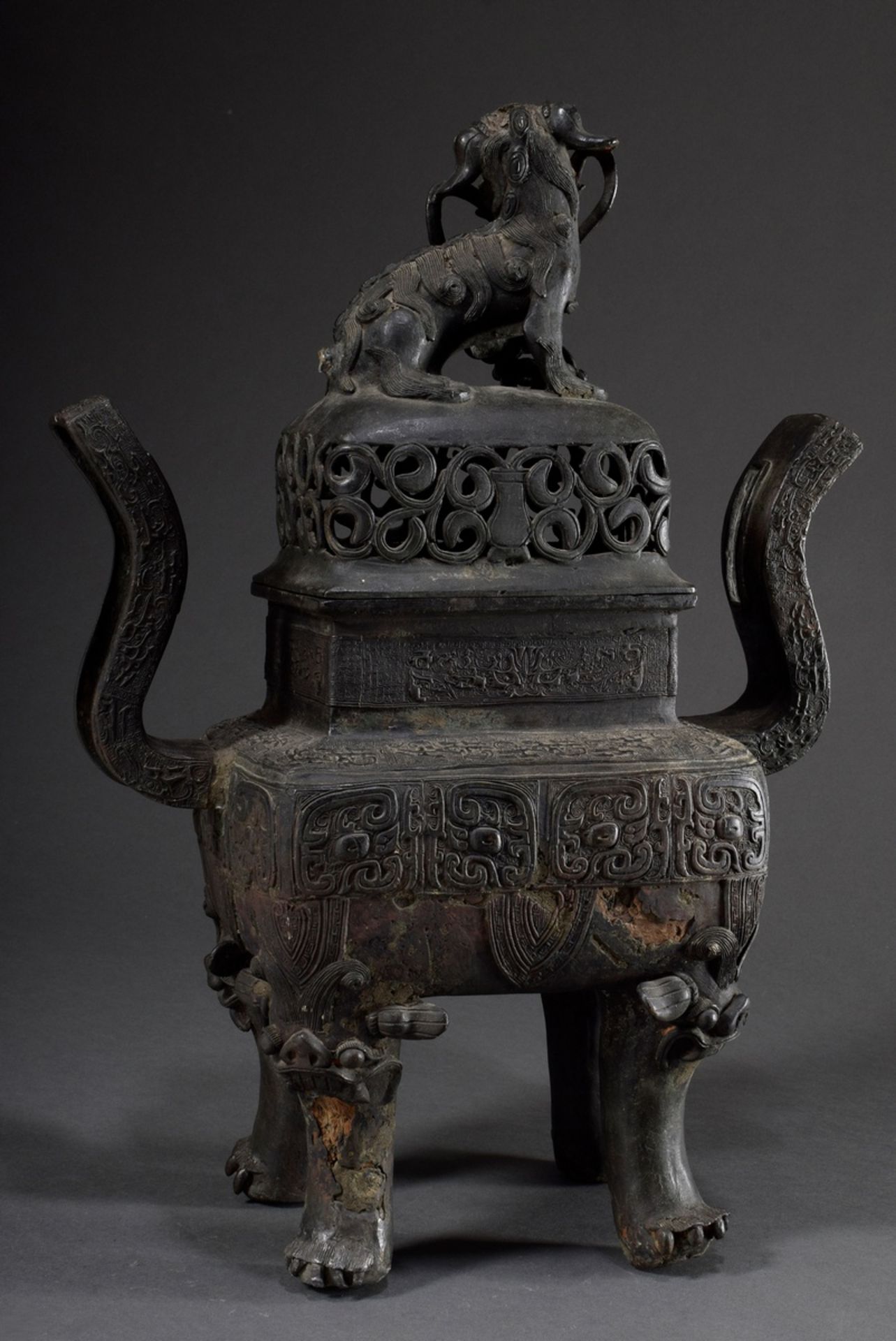 Large angular bronze lidded koro with archaic reliefs paw feet and fo-lion knob, China Qing period, - Image 2 of 13