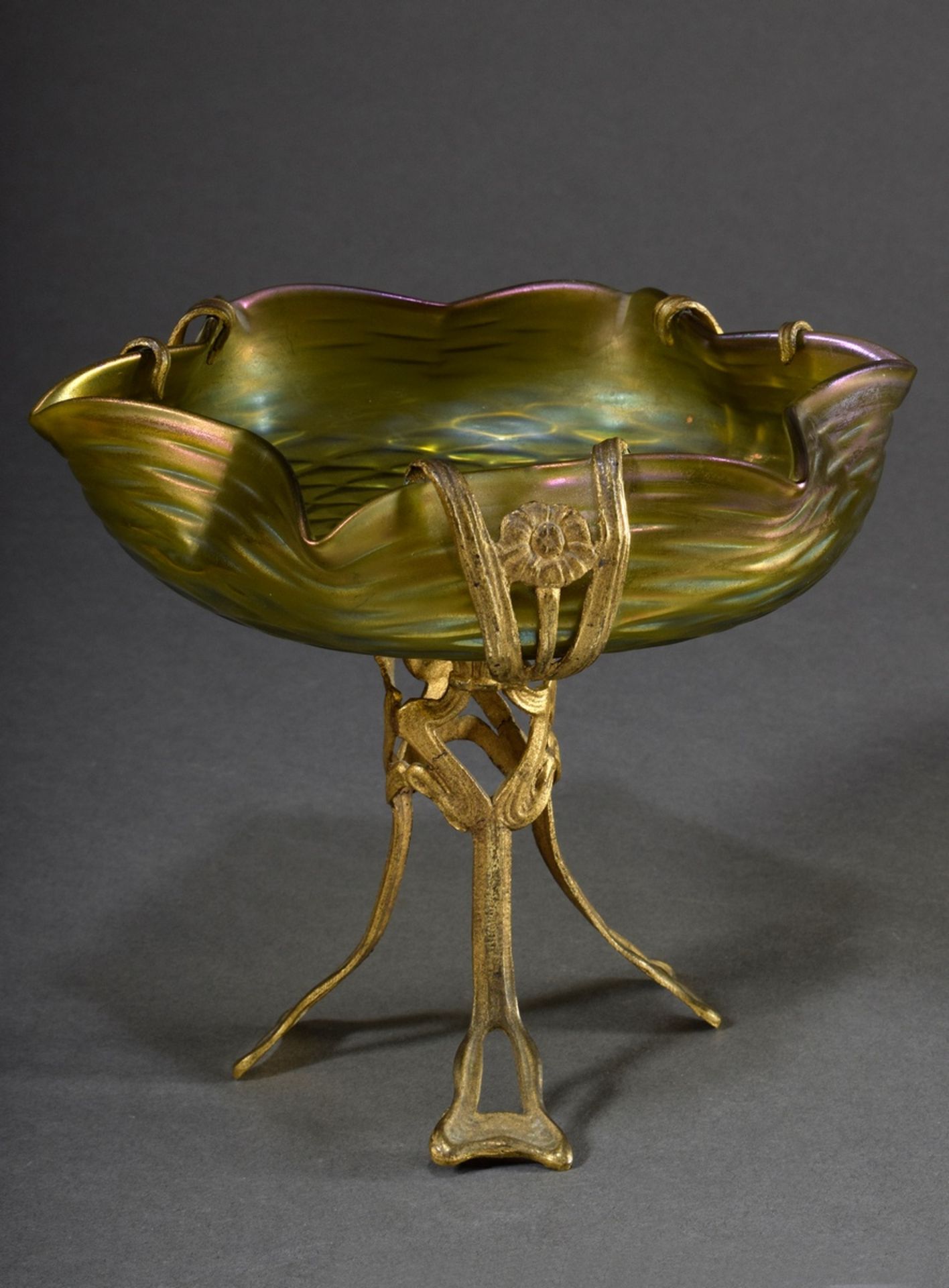 Art nouveau top with fire-gilt zinc cast frame and light green to yellowish iridescent glass bowl i