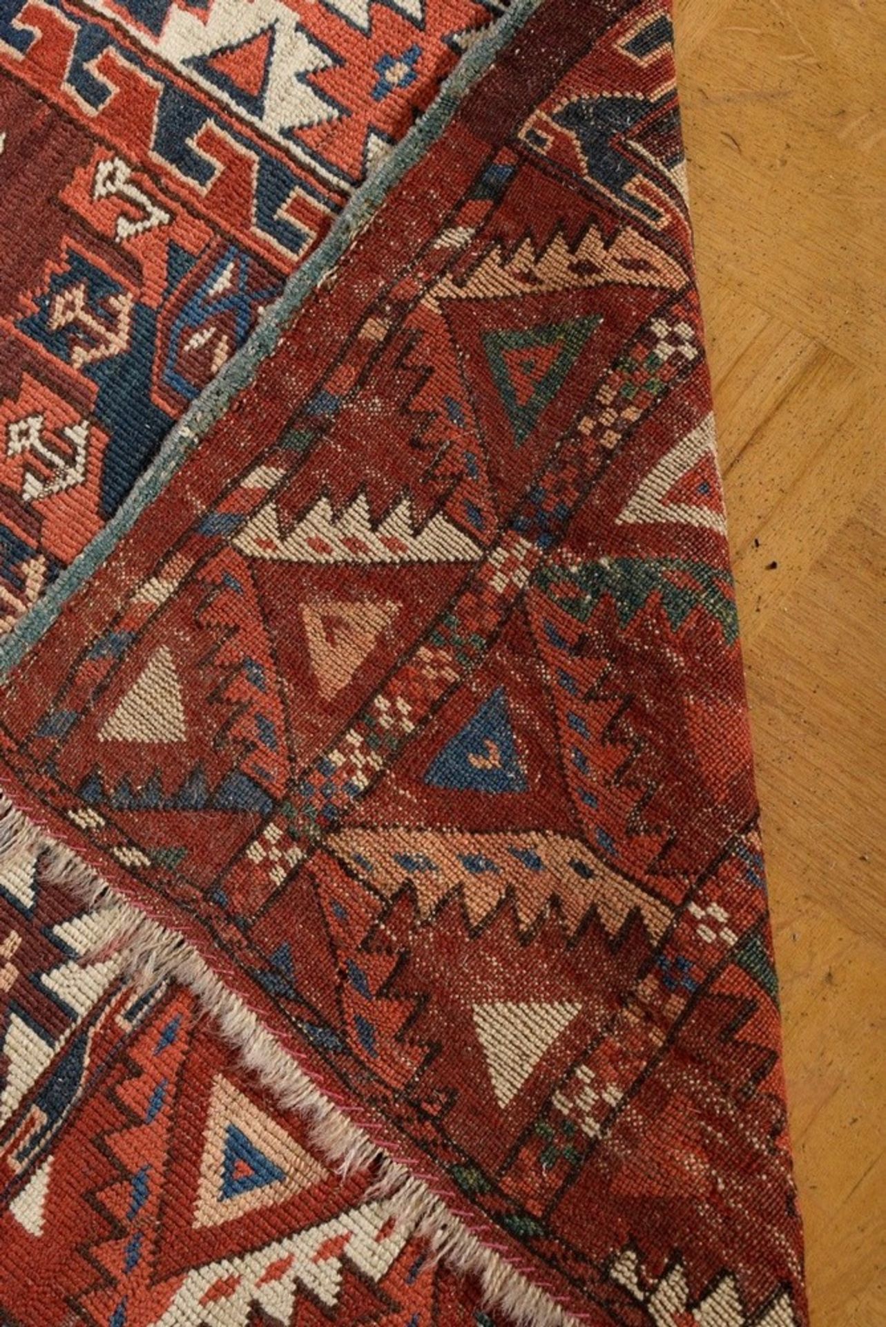 A Yomud main carpet with flat kepse güls arranged in offset colours, a white-ground main border wit - Image 6 of 7