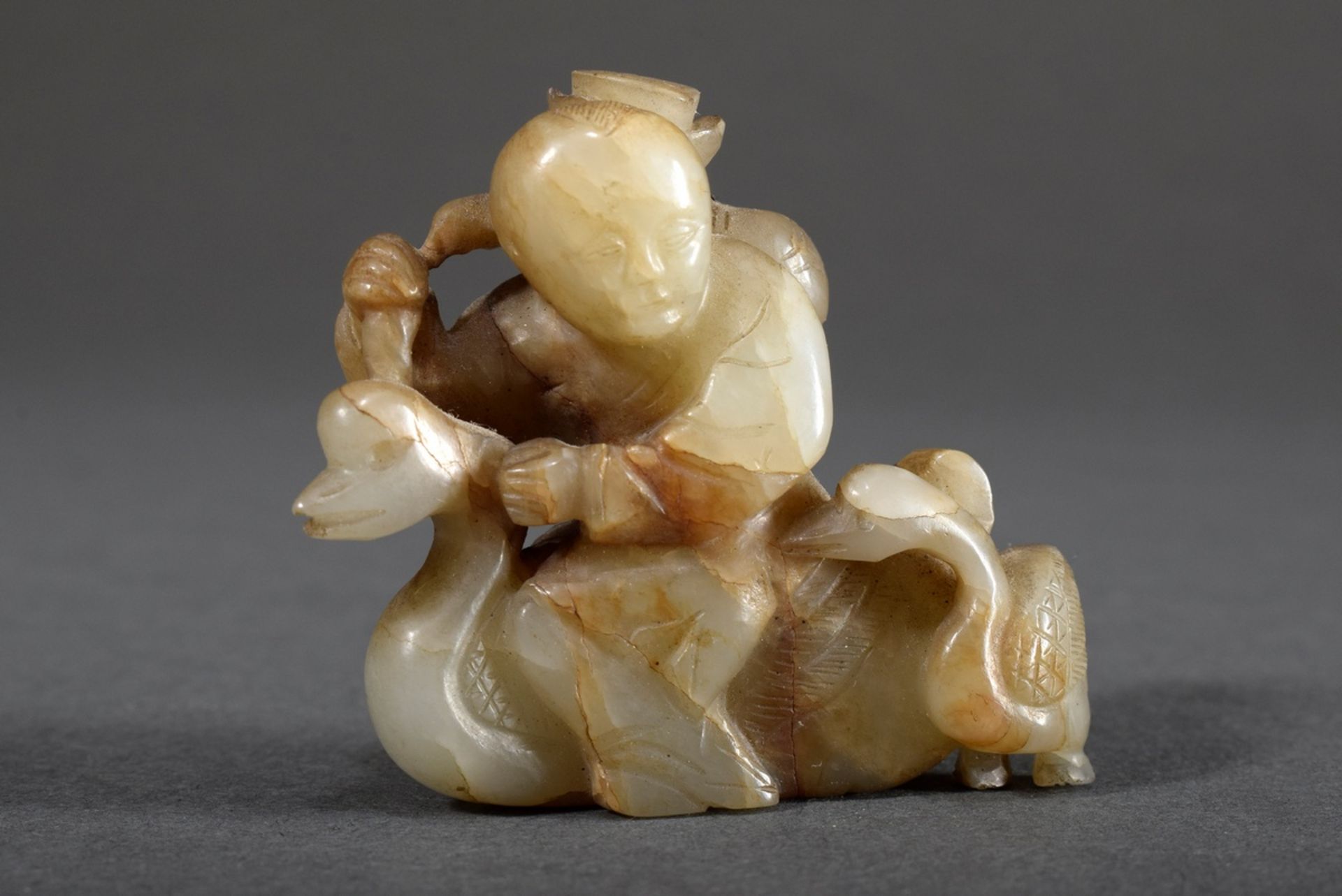 Small Chinese jade carving "Immortal with lotus, sitting on a goose", 5x6cm
