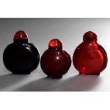 3 Diverse Pekingglas Snuffbottles in schlichter Form, Rubinglas und schwarzes Glas, H. 5-6cm, etw.